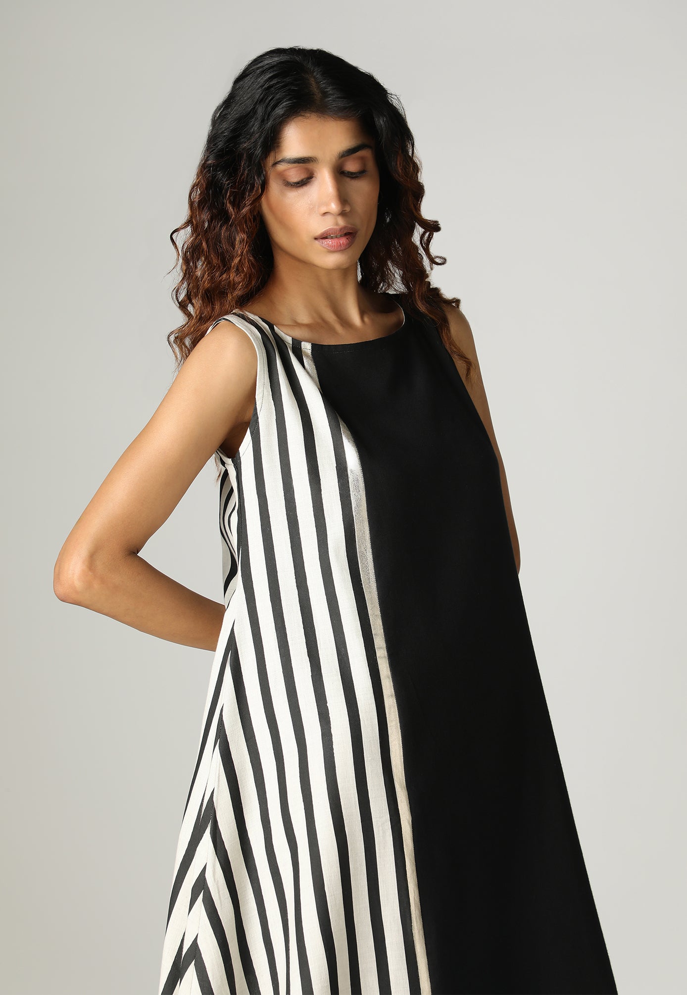 BEHIND BARS DIAGONAL FLARE DRESS